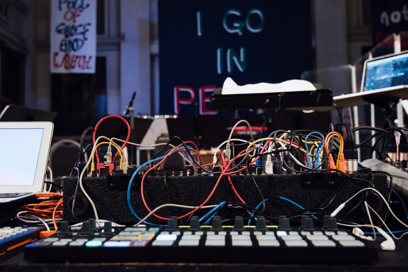 A music deck with lots of colourful wires coming out of it