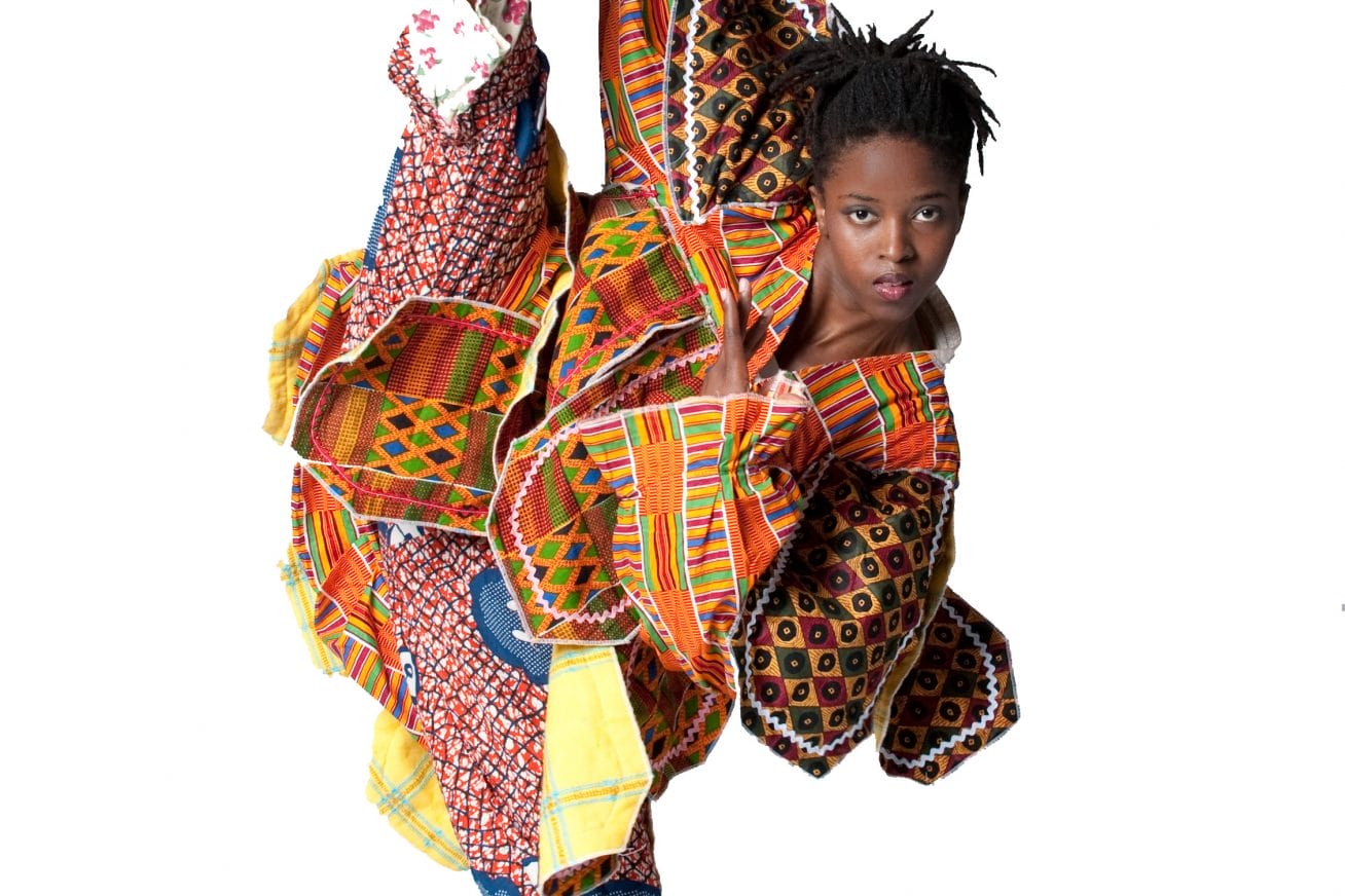 Celebrating Afro-Luso culture - a dancer poses in a split pose