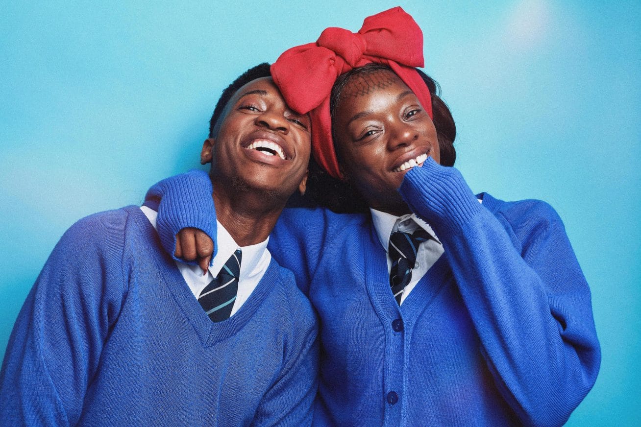 Toybox. two people in school uniform